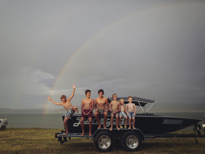 Kids with boat on the shores of Lake Burrendong