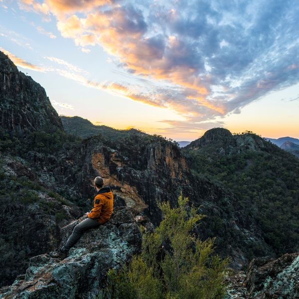 Man Watching Sunset Over Warrumbungle National Park