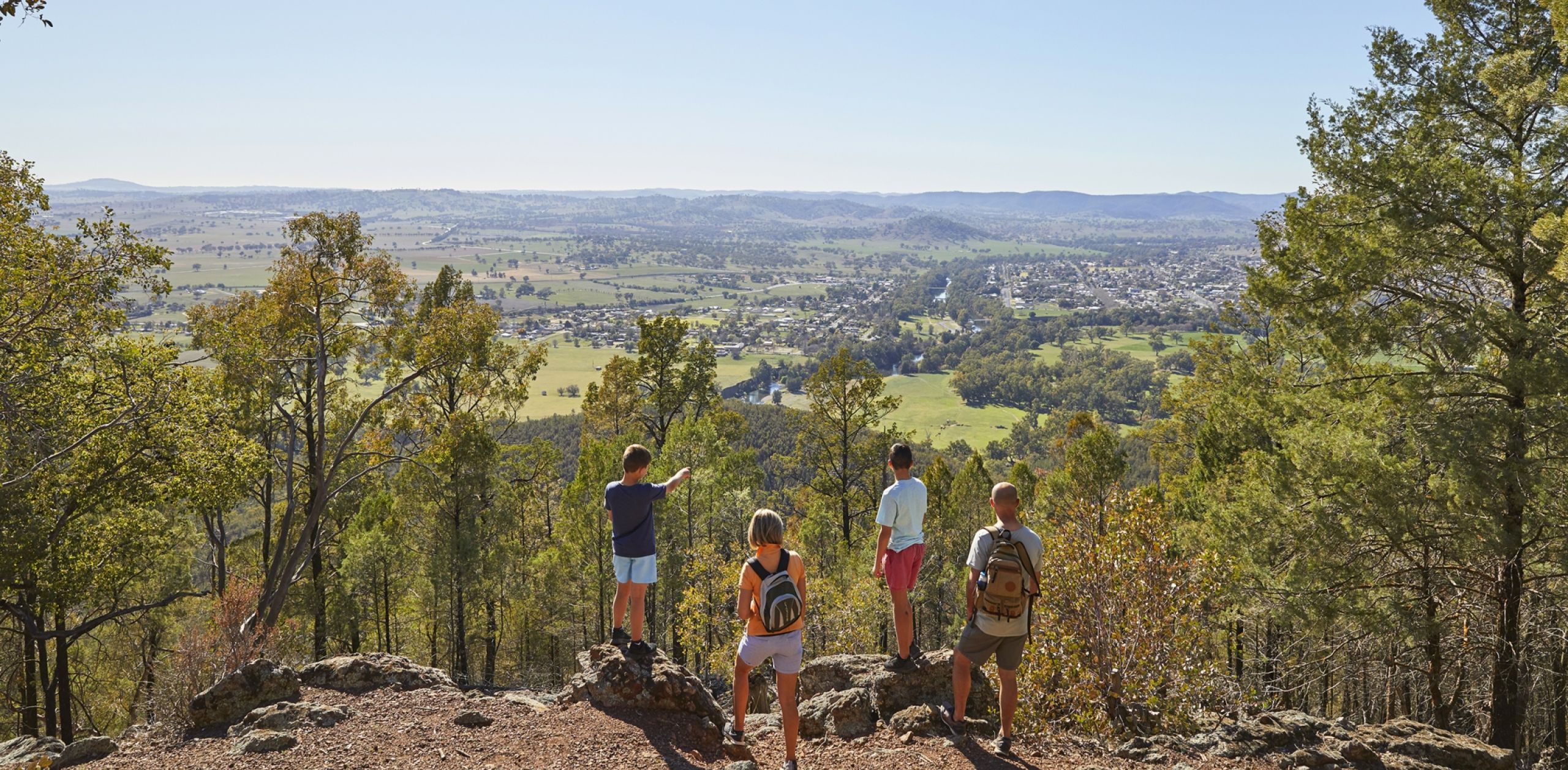 Family hiking on Mount Arthur Reserve near Wellington