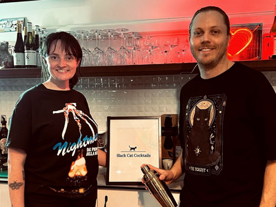 Jess and Tommy black cat picture